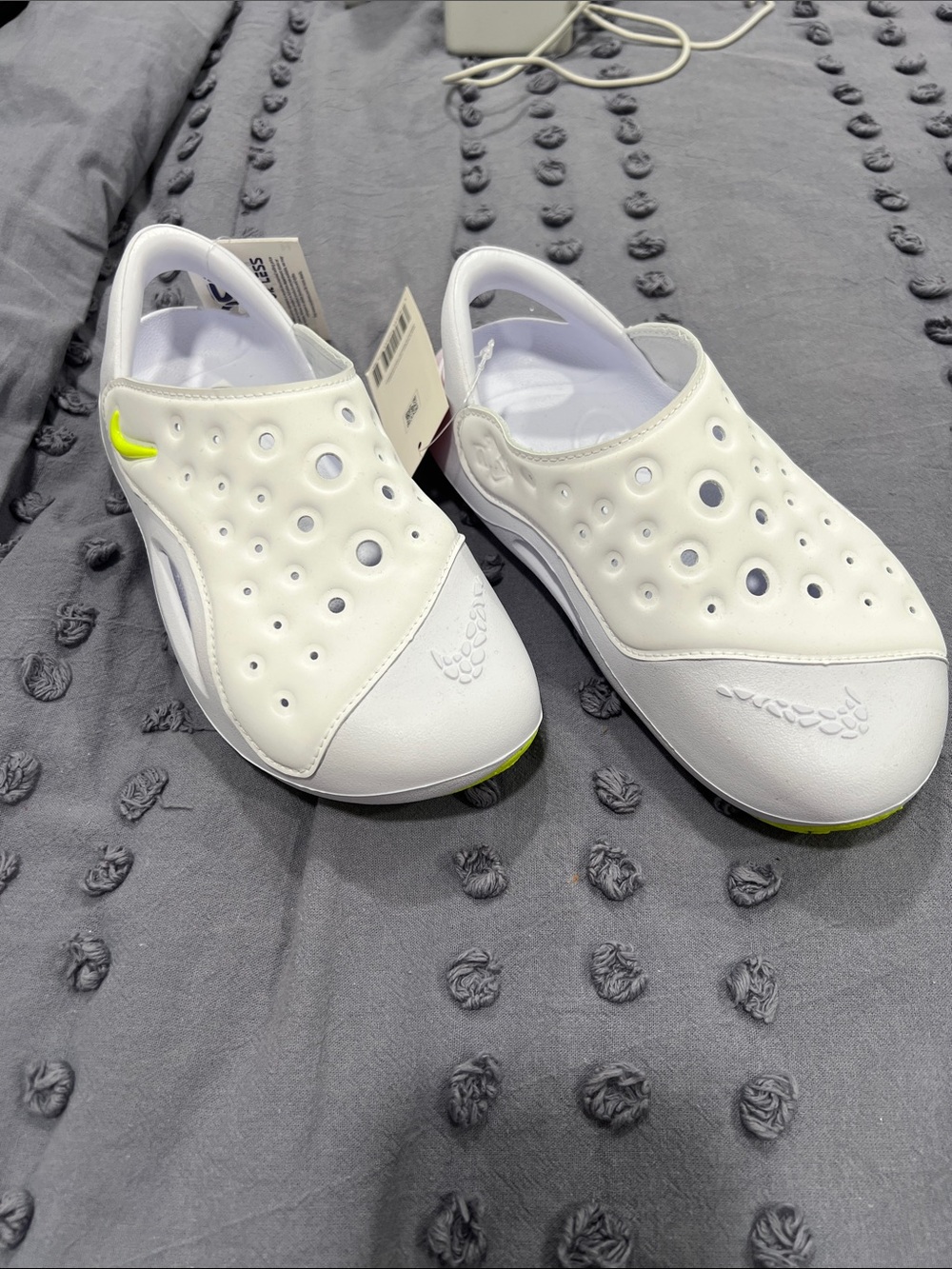 Nike Kids White Slip-On Sandals with Lime Accent